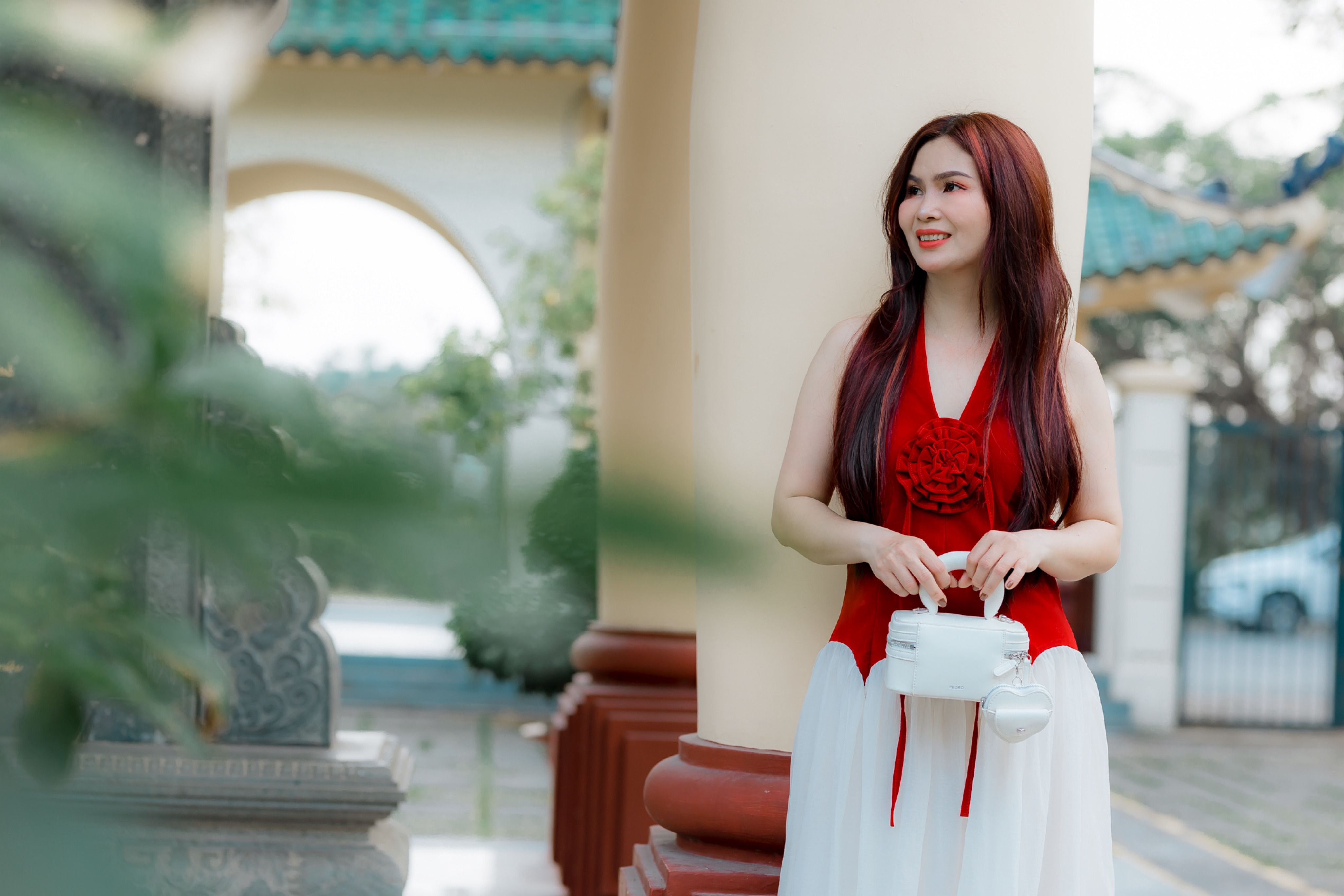 Elegant Woman in Red Dress Outdoors by Pillar · Free Stock Photo