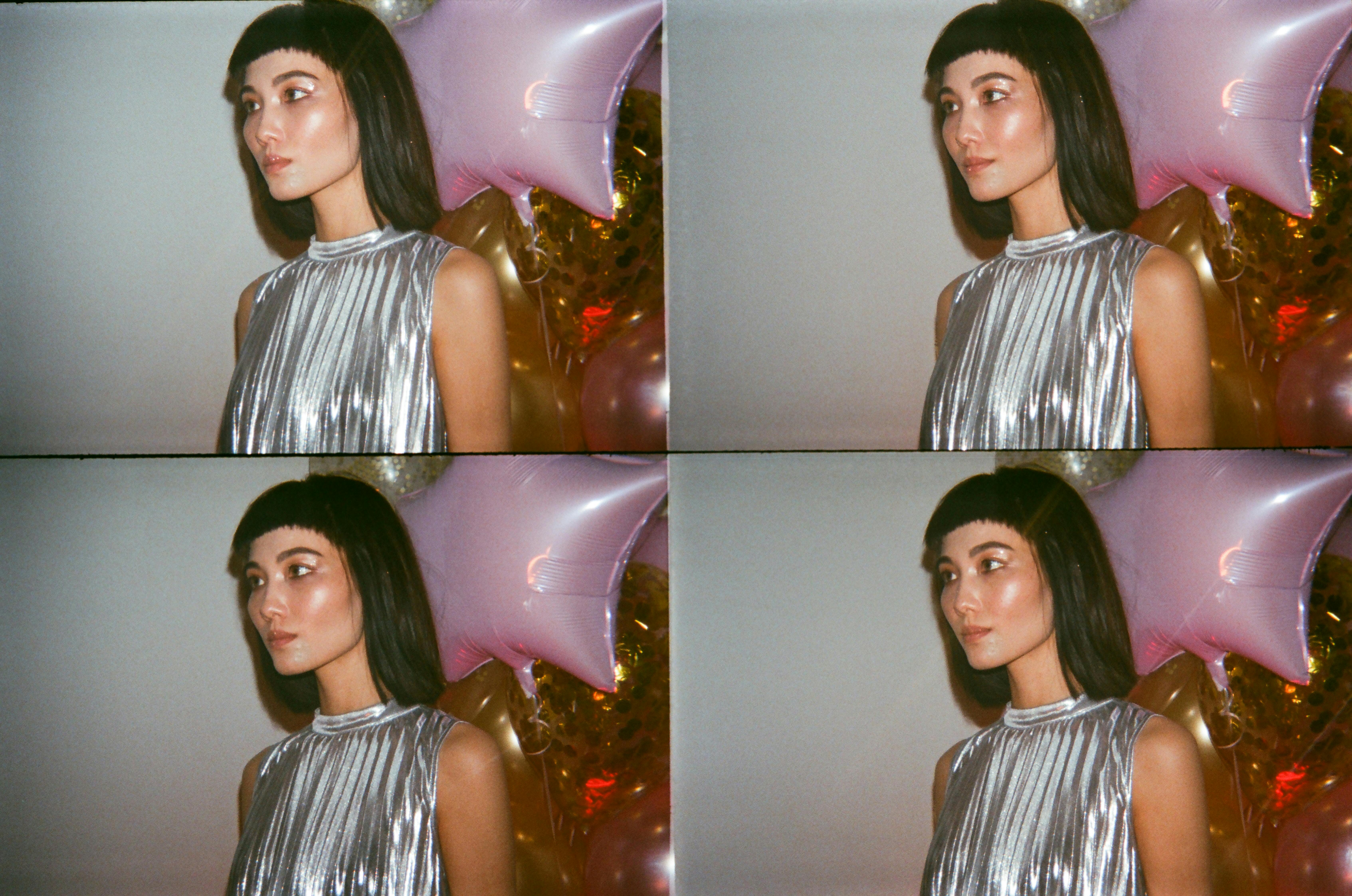 Gratis Foto Tampak Samping Wanita Yang Berdiri Di Dekat Balon Foto Stok