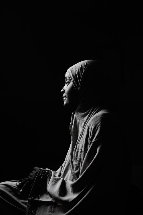 Free Captivating black and white portrait of a woman in traditional attire. Stock Photo