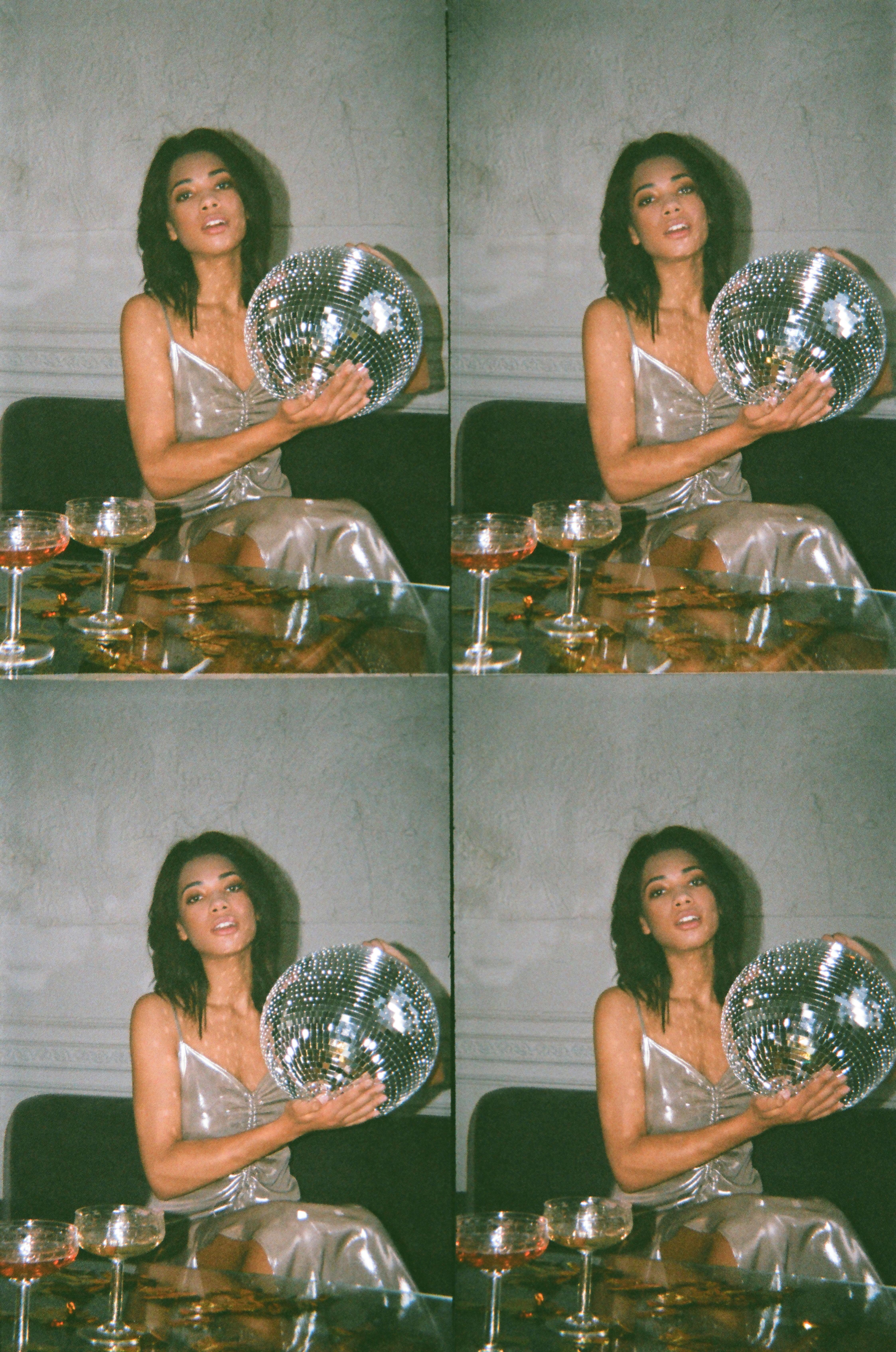 woman holding disco ball