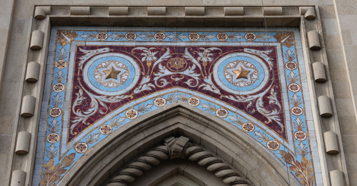 Detailed Architectural Tile Design on Historic Building · Free Stock Photo
