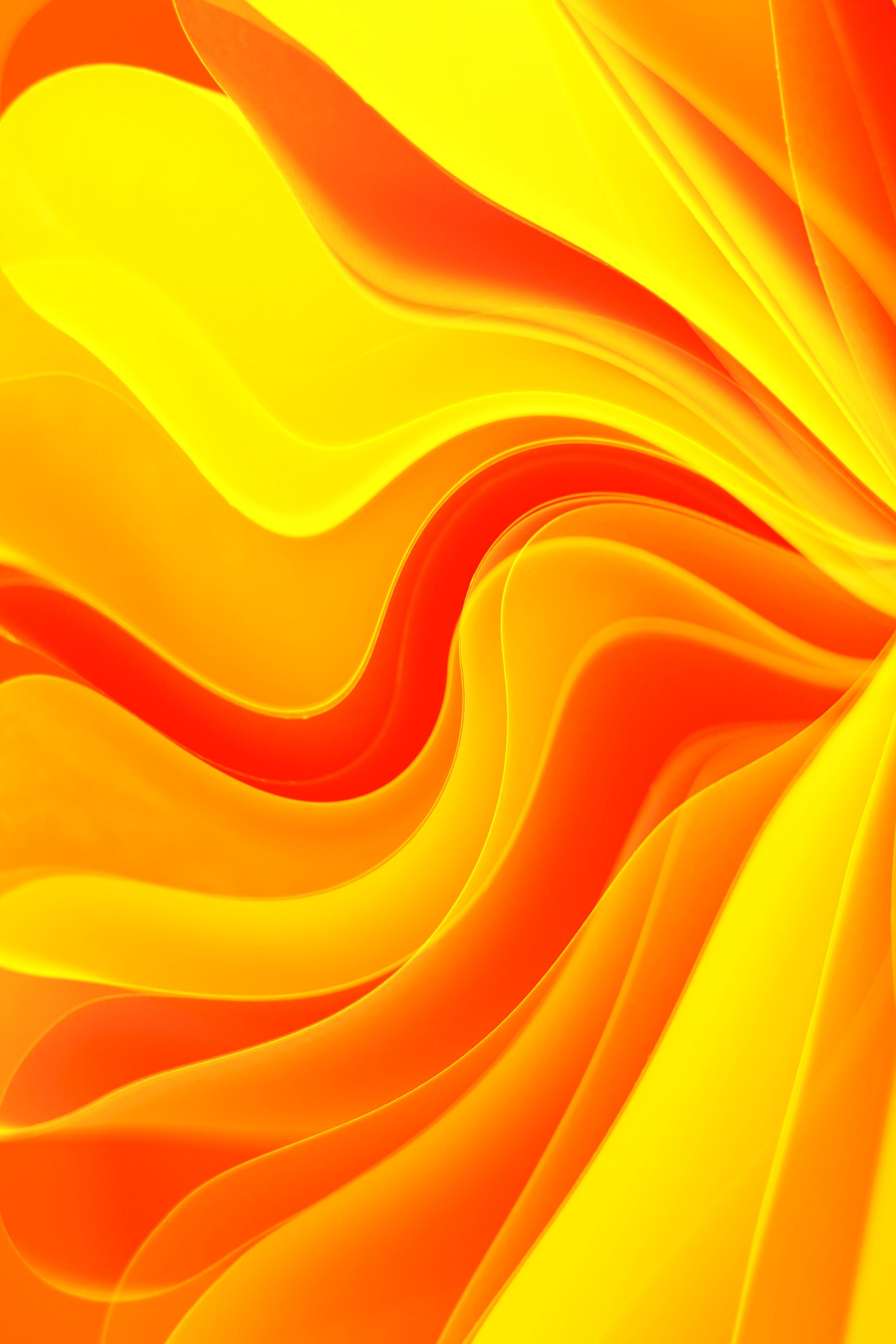 Vibrant Abstract Swirls in Yellow and Orange · Free Stock Photo