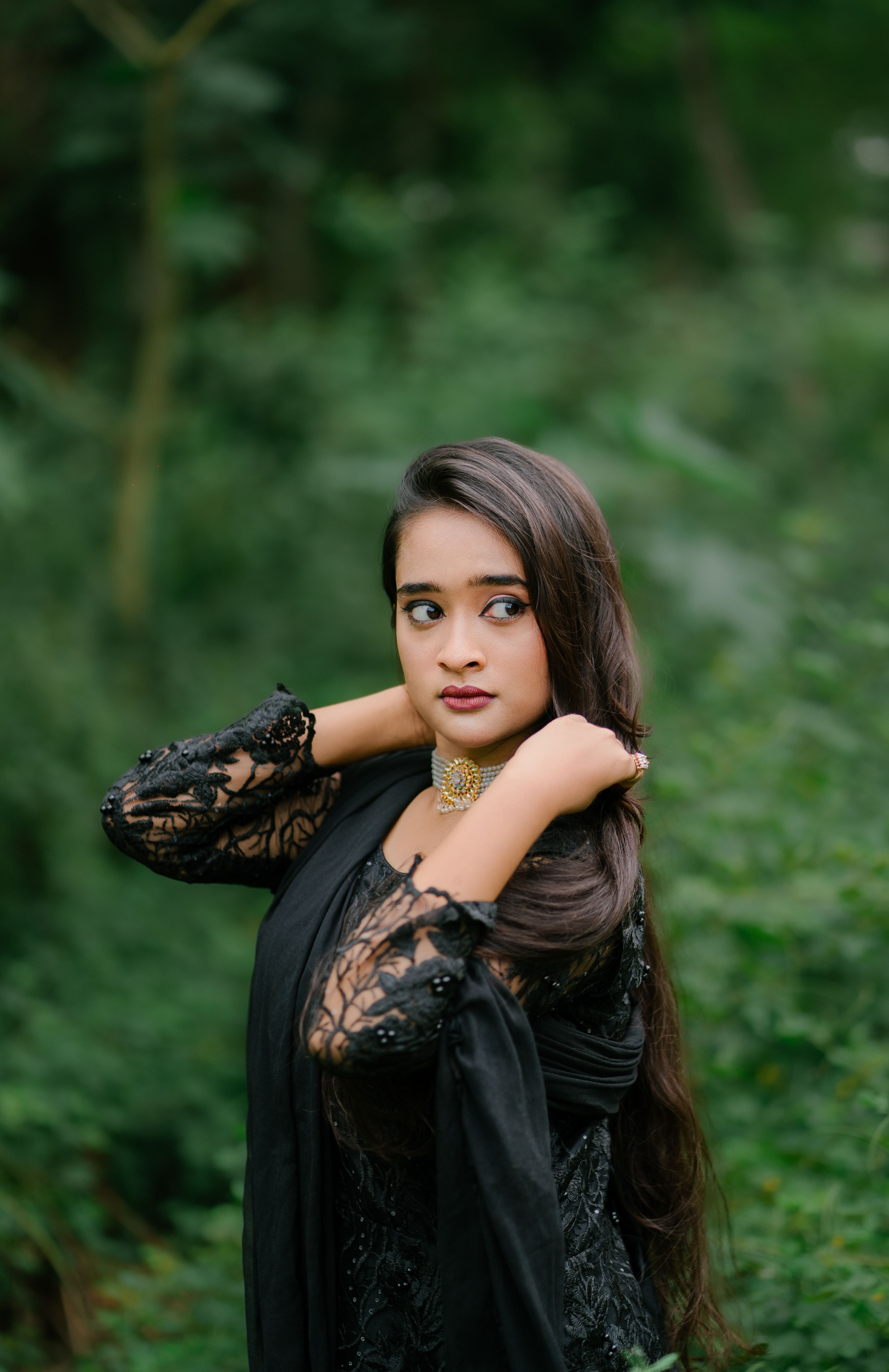 Young Woman in Traditional Dress in Greenery Free Stock Photo Young Woman in Traditional Dress in Greenery Free Stock Photo