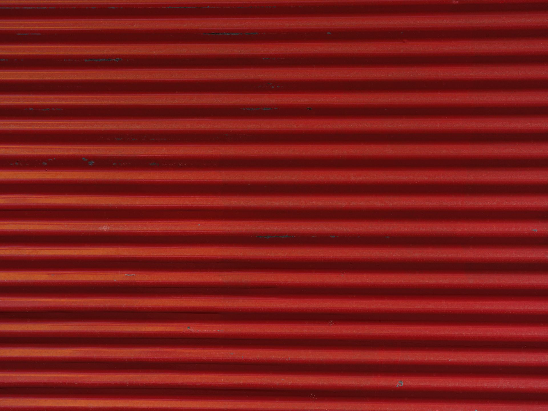 red painted storefront shutter
