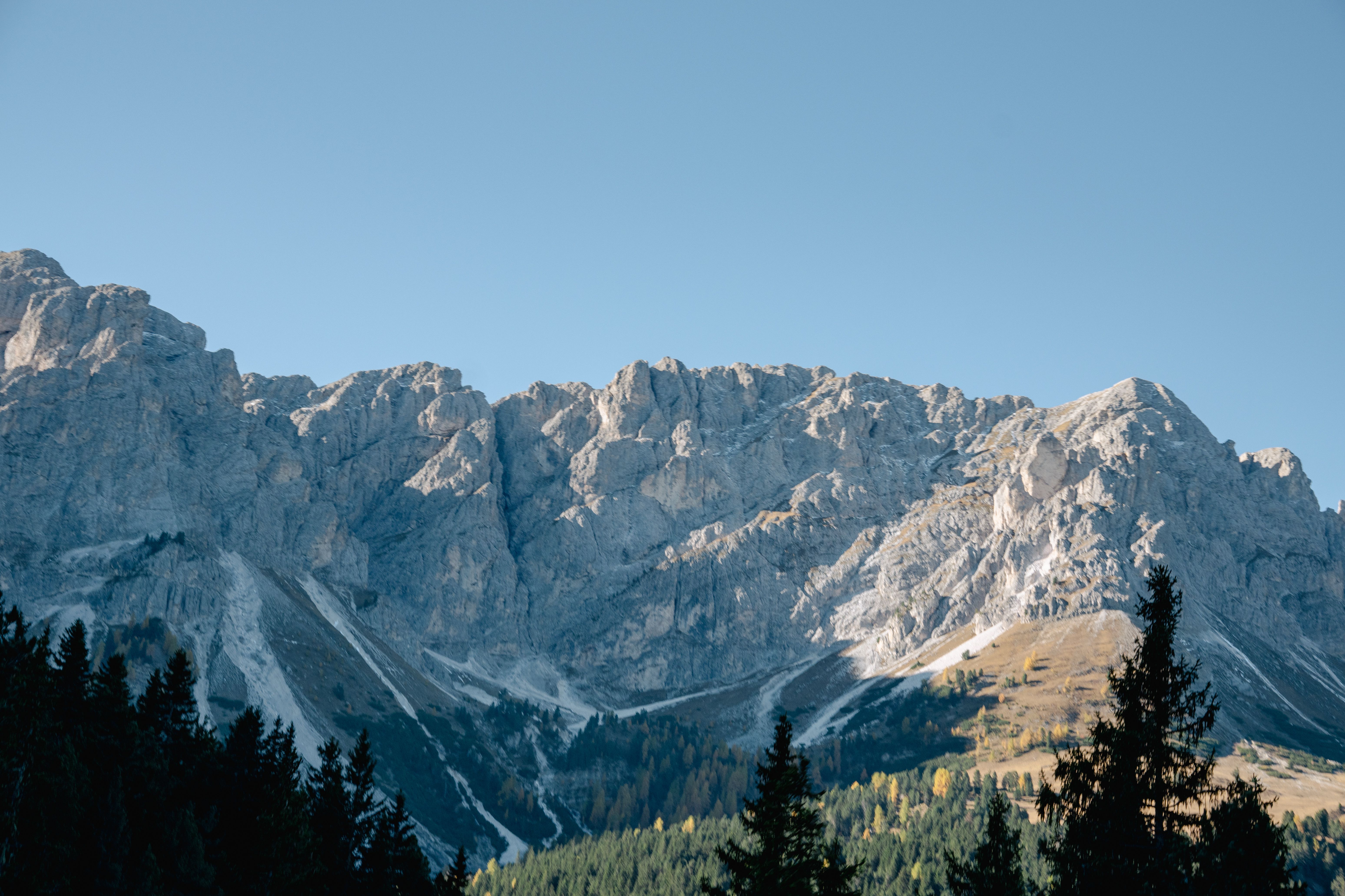 Stunning Mountain Range Under Clear Blue Sky · Free Stock Photo