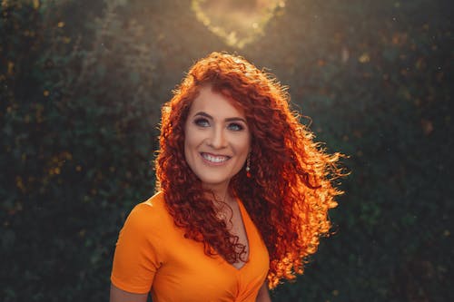Photo Of Woman Wearing Orange Top