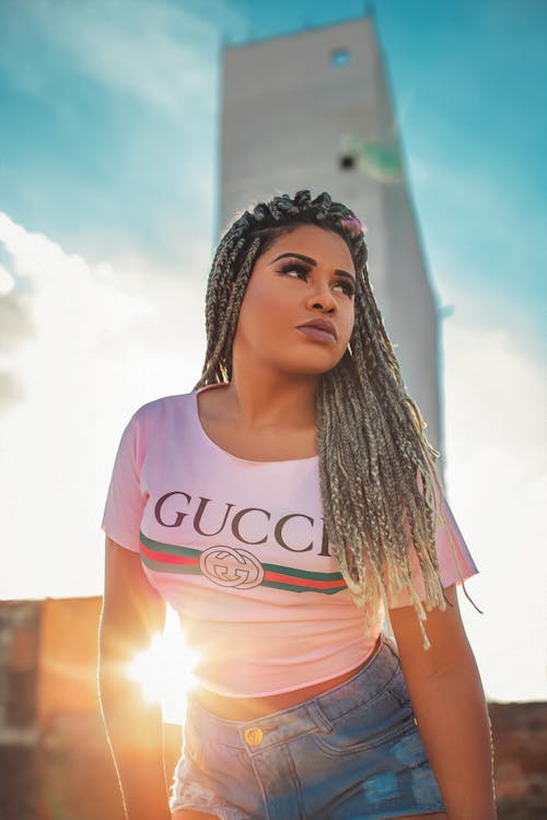 Woman Wearing A Gucci Shirt