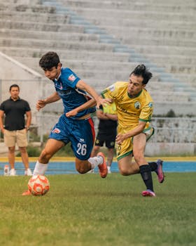 Intense soccer match with players tackling for ball control. Energetic and competitive sports scene.