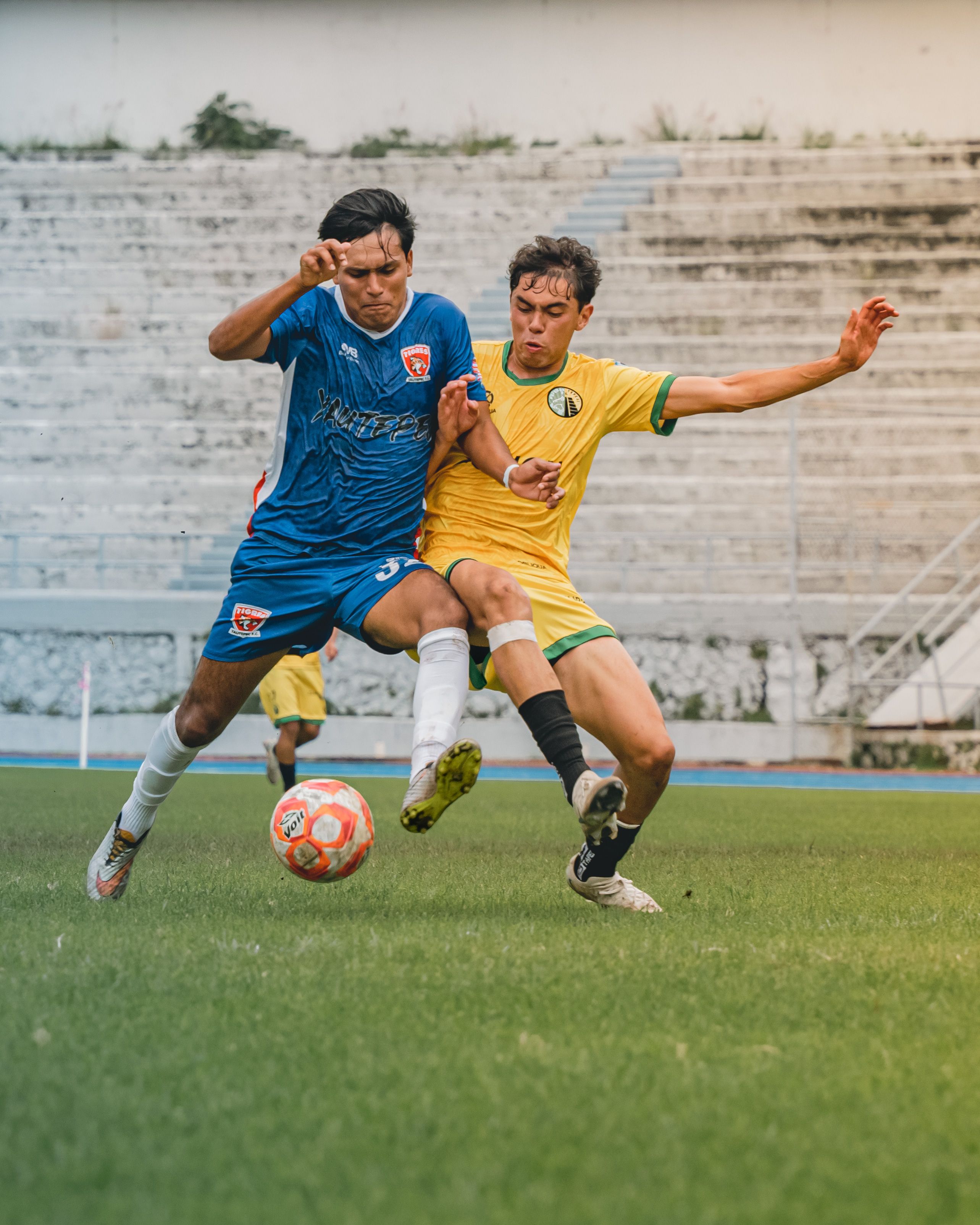 Competitive Soccer Match at Outdoor Stadium · Free Stock Photo