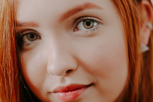 Close Up Photo of Woman's Face