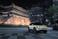 Modern Electric SUV in Seoul's Nightscape