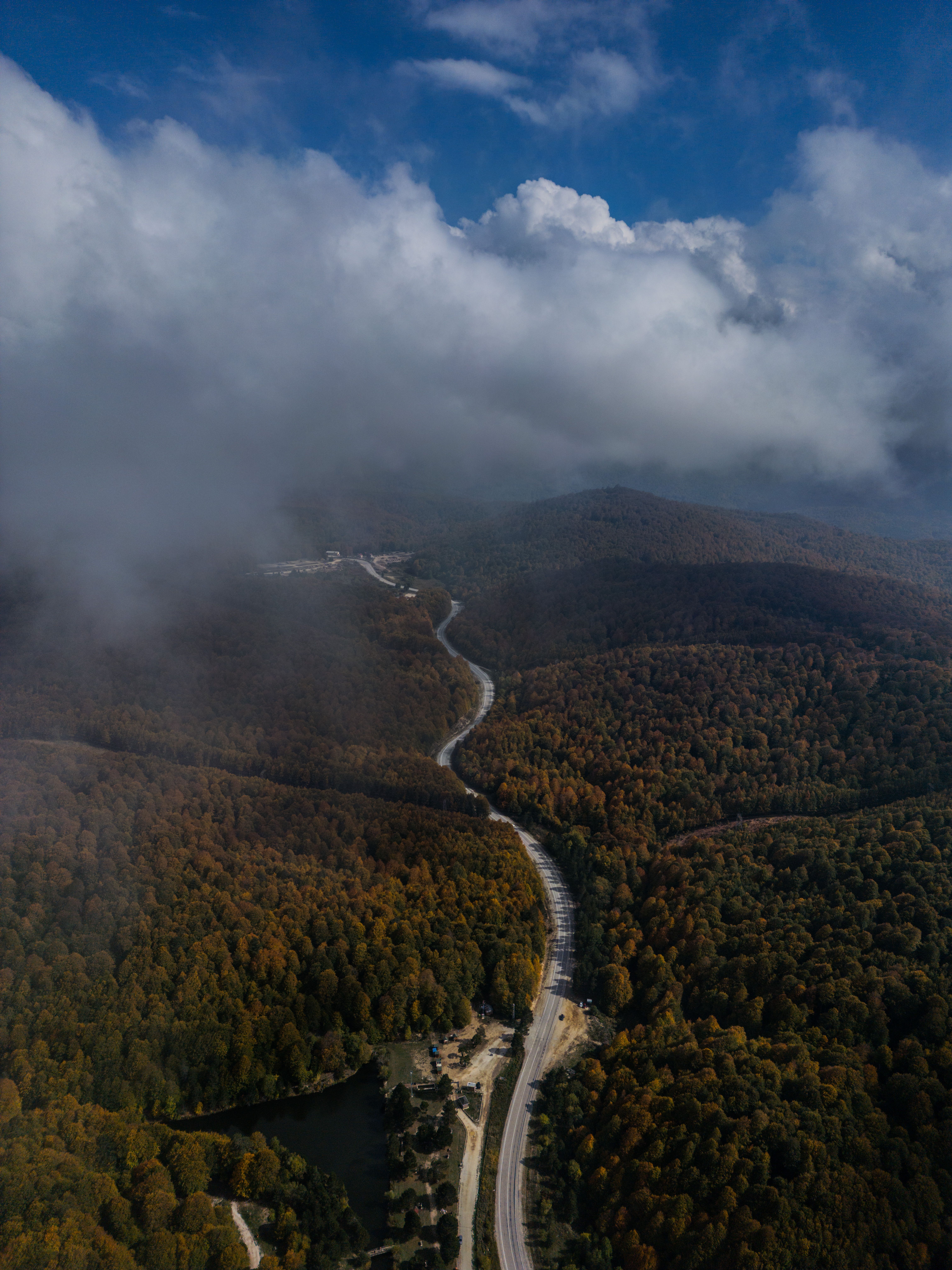 Aerial View of Winding Mountain Road in Autumn · Free Stock Photo