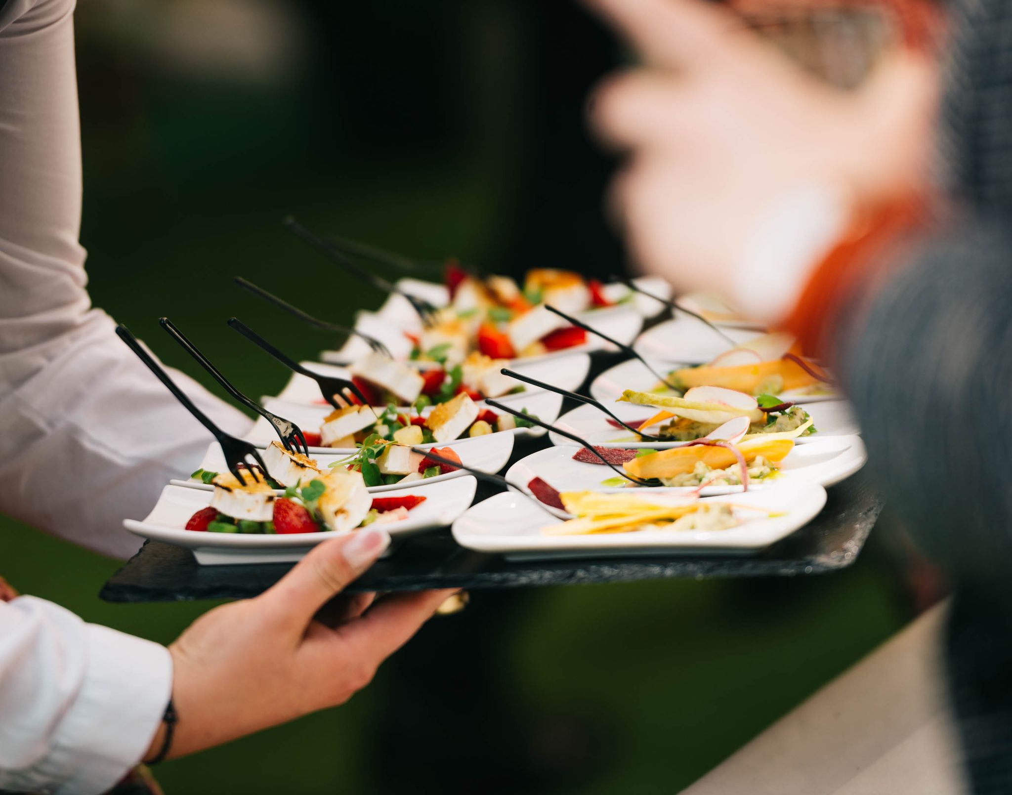 Catered dishes set out for an event