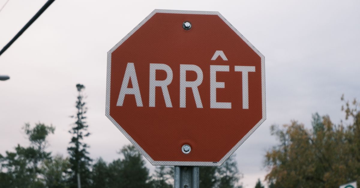 For sale sign in front of a Canadian home, a rare sight among homeowners renewing mortgages