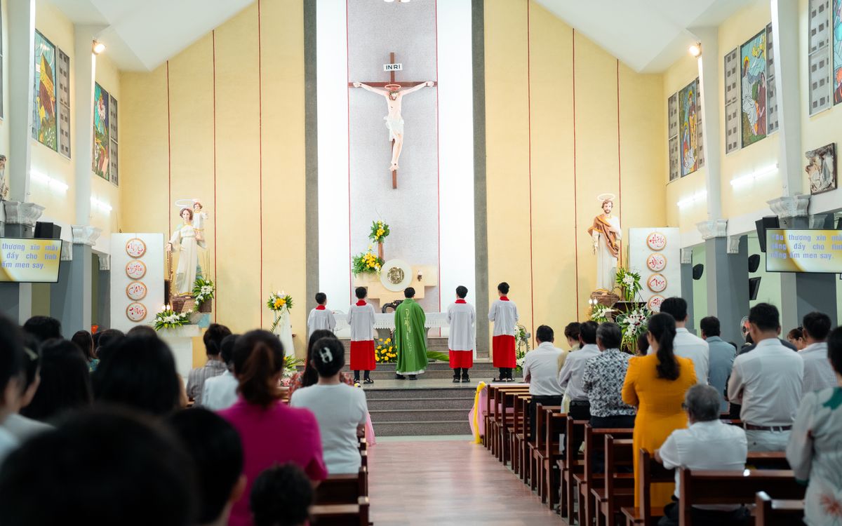 A church service with a congregation and clergy, highlighting religious tradition.