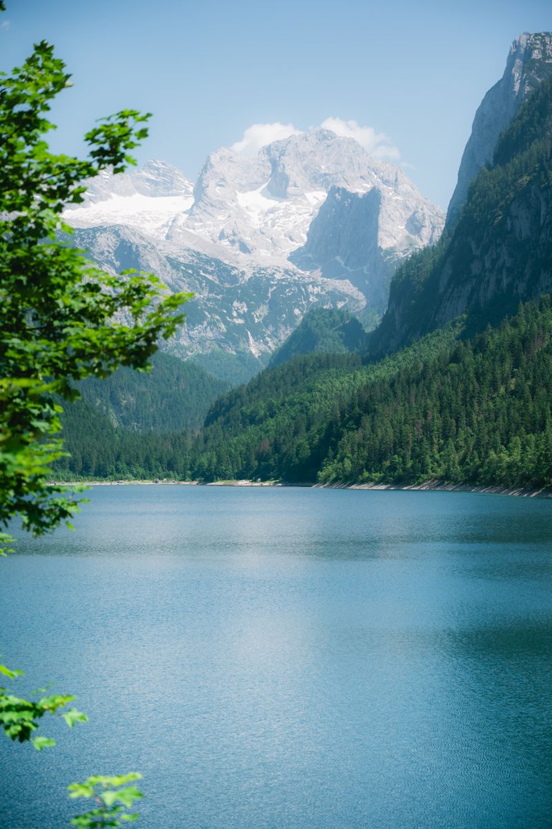 Scenic Alpine Lake and Mountain Range in Austria · Free Stock Photo