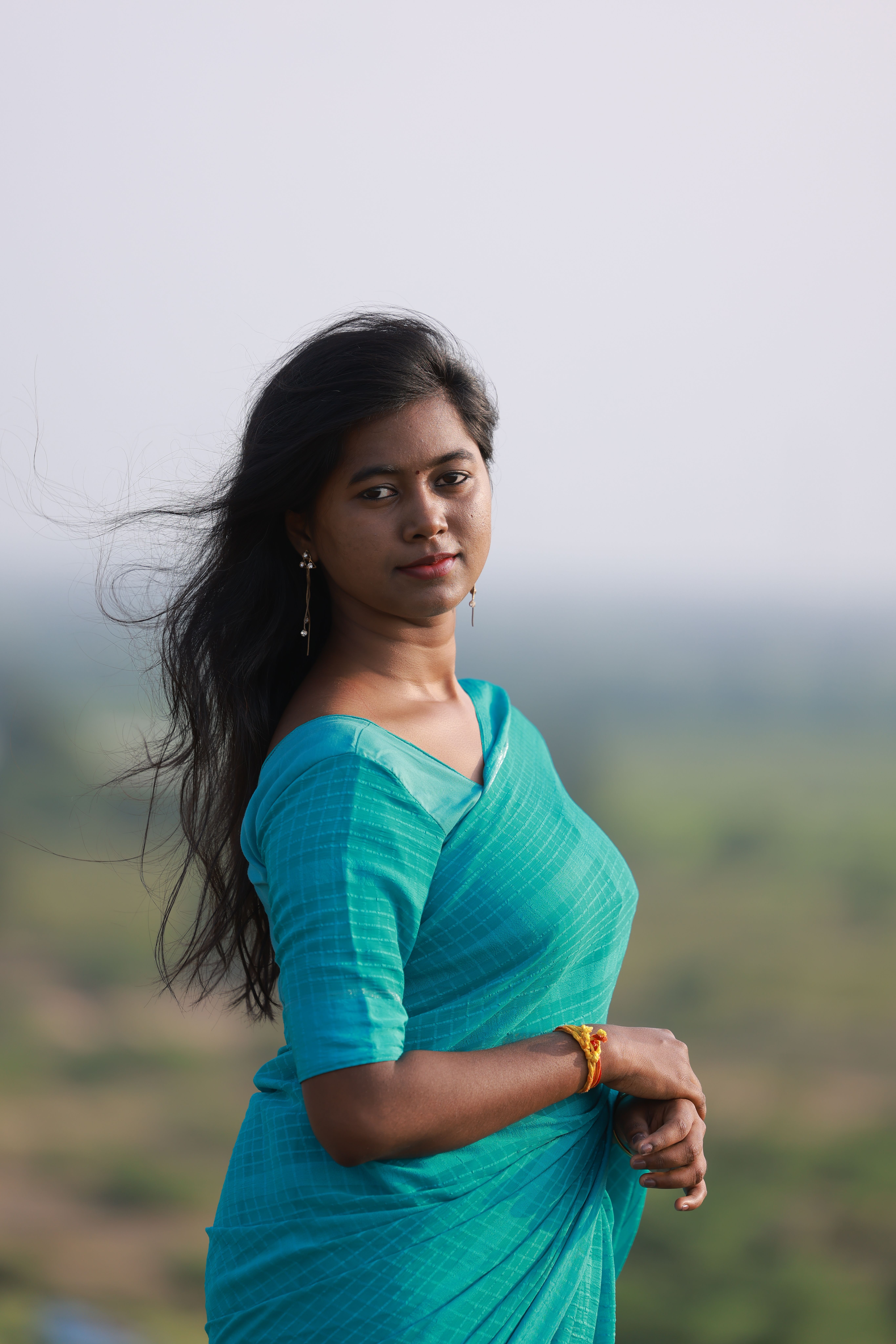 Portrait of a Woman in Blue Sari Outdoors · Free Stock Photo