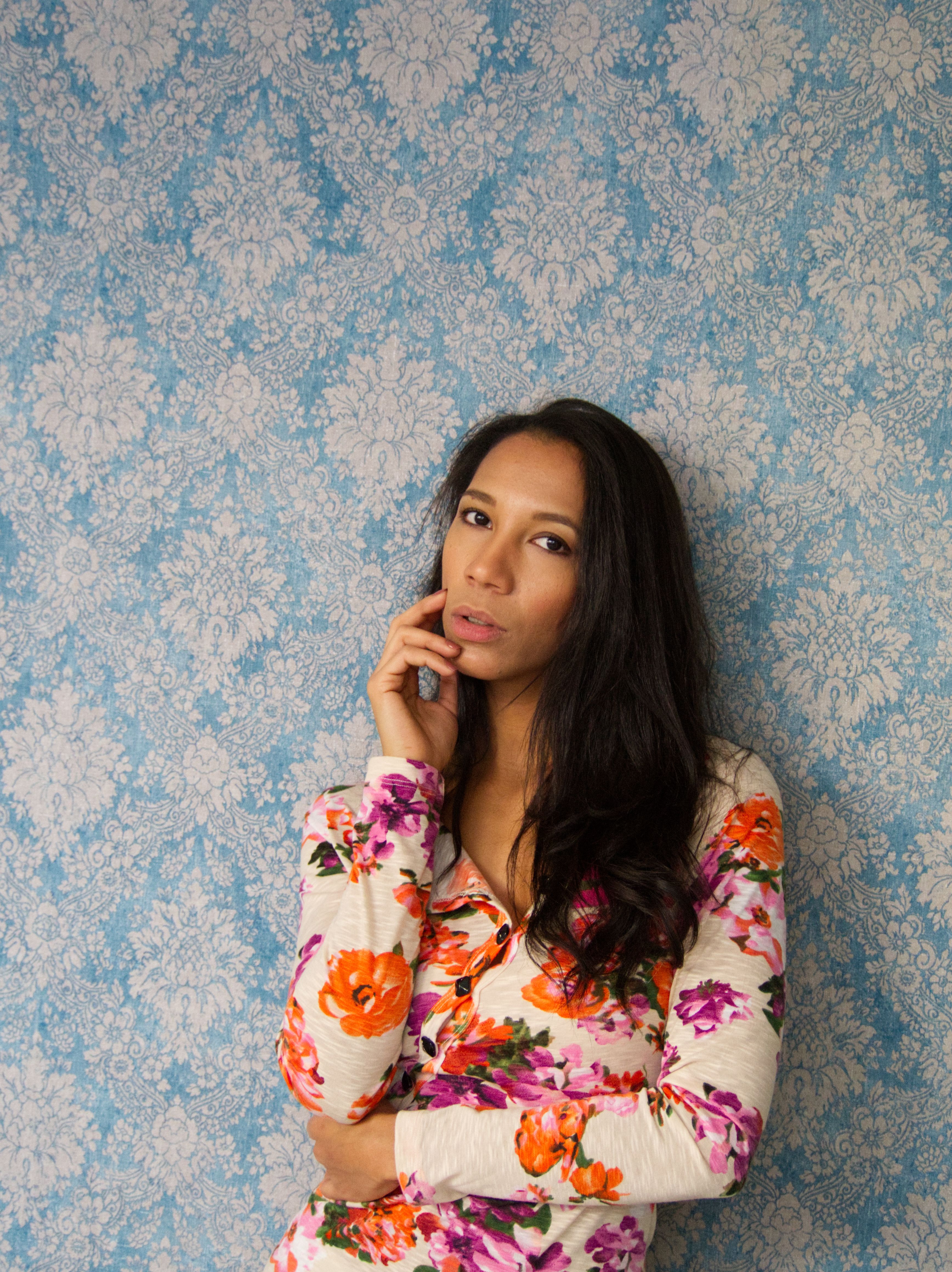 Elegant Woman in Colorful Floral Dress Portrait · Free Stock Photo