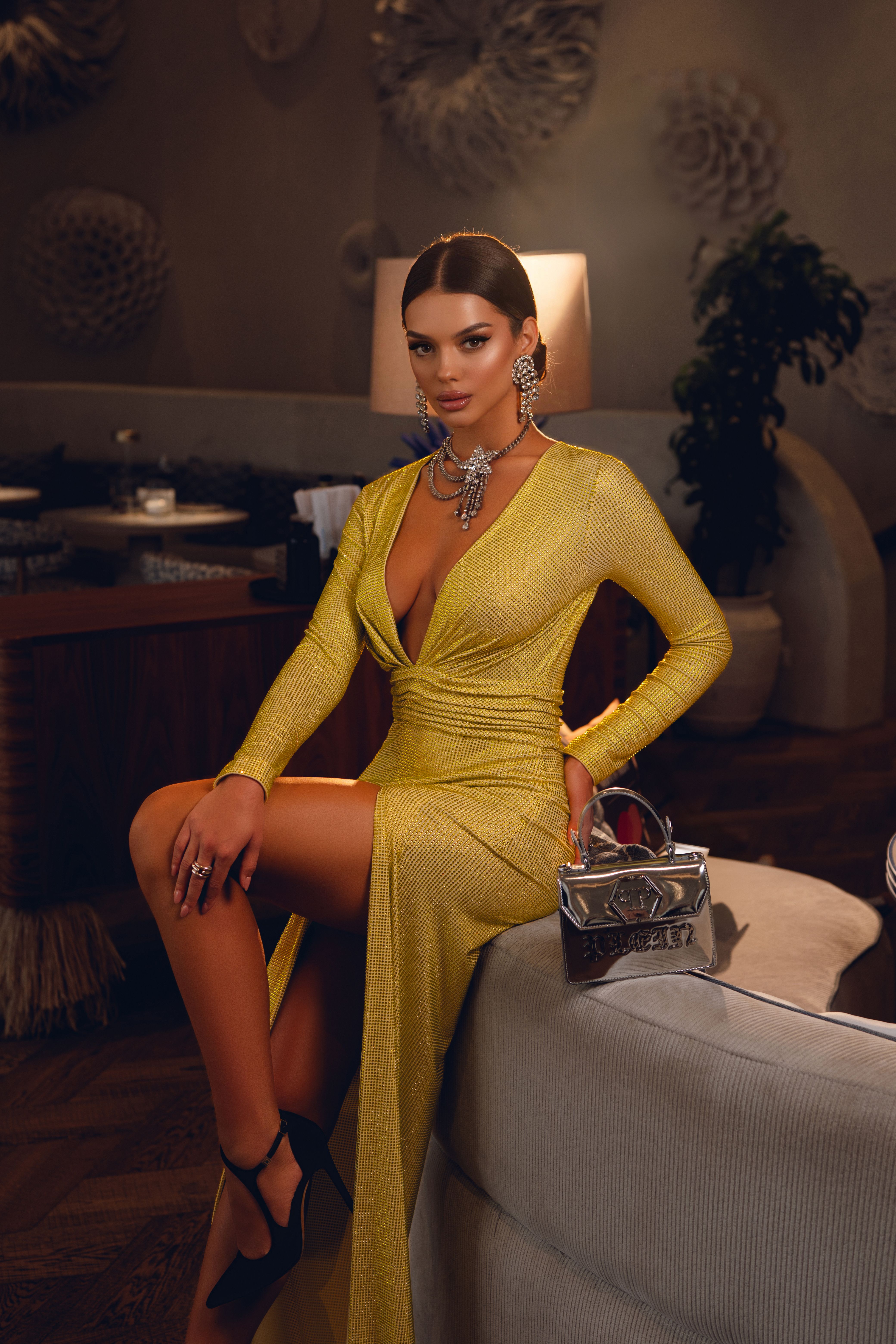Glamorous Woman in Elegant Yellow Evening Gown