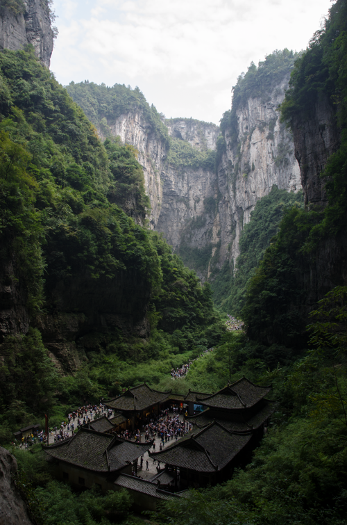 Free Discover the breathtaking Wulong Karst landscape featuring lush greenery and majestic cliffs. Stock Photo