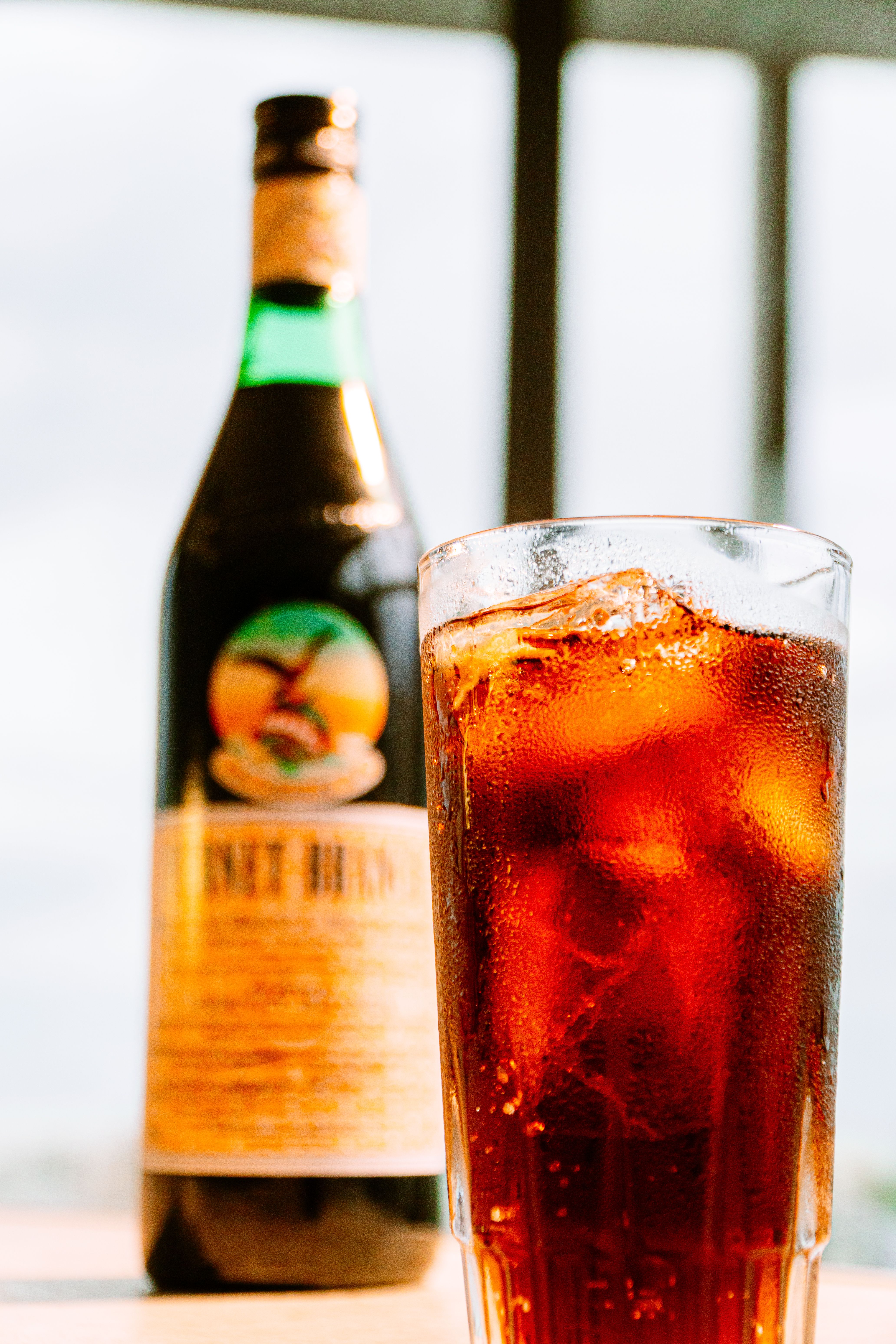Refreshing Fernet Branca served over ice, captured in Buenos Aires bar setting.