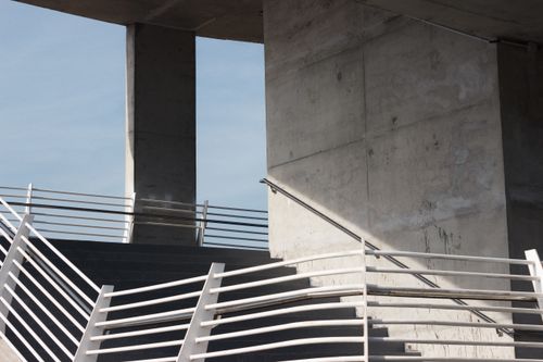 Free Concrete architecture with metal railings at a modern structure in Rabat, Morocco. Stock Photo
