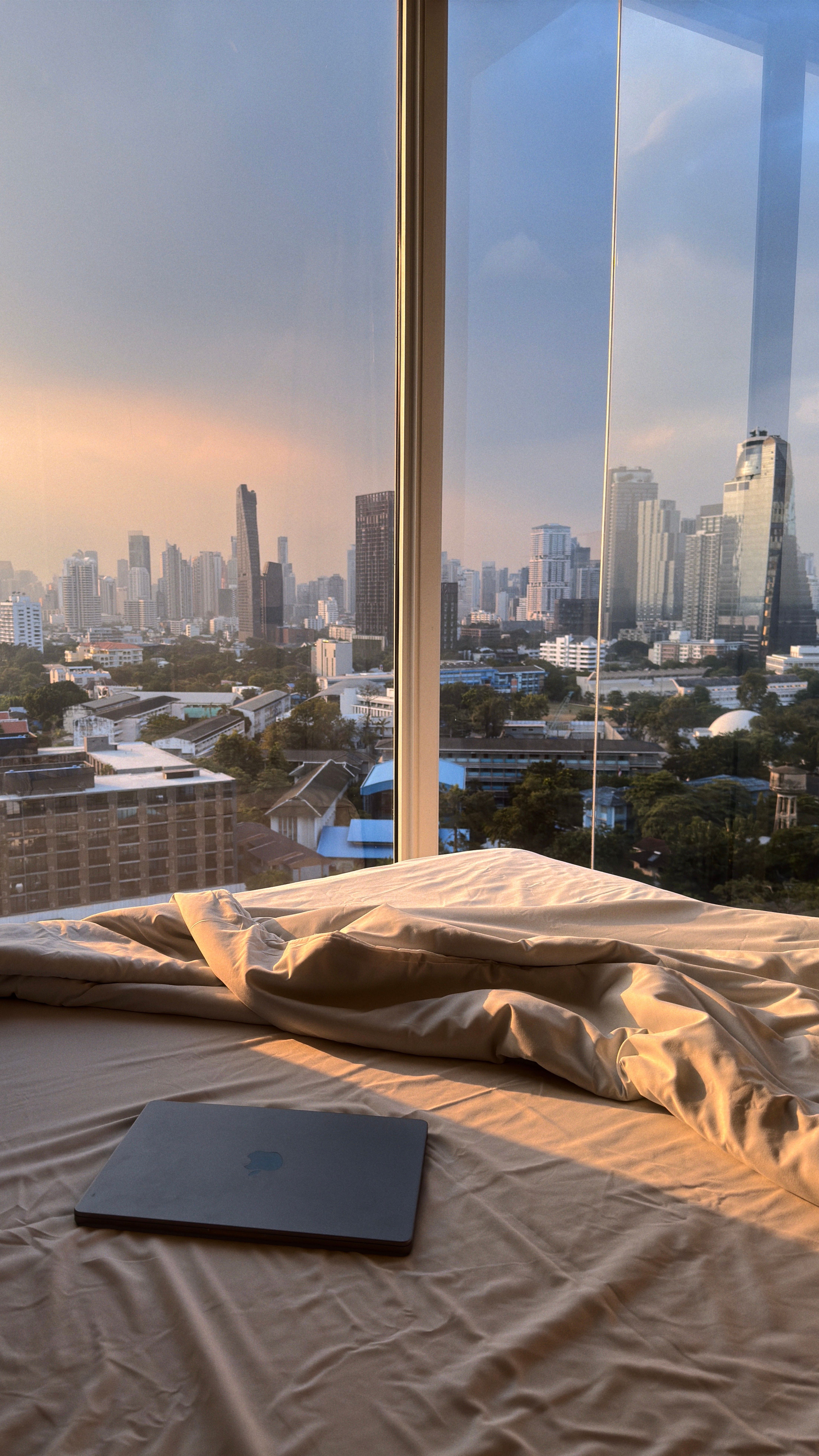 Traveler planning a trip with a city skyline behind them