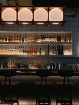 Stylish bar in Bangkok, Thailand with sleek lighting and a modern vibe.