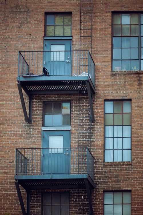 Free Close-up of fire escape on a brick building facade in Macon, Georgia, USA. Stock Photo