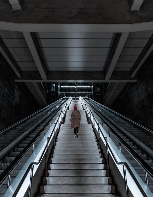 Photo of Person Climbing Stairs