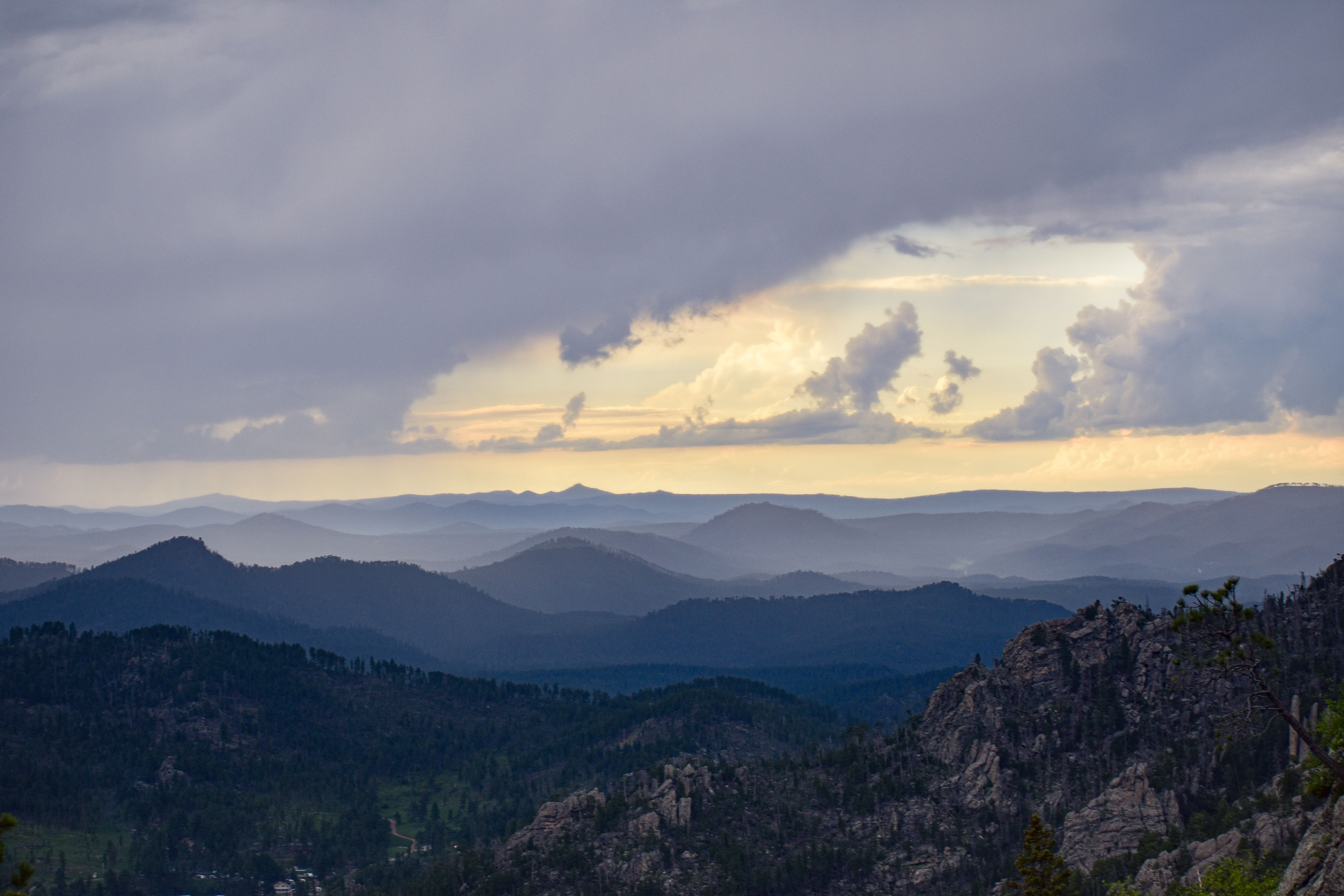 Layered Colorado mountains at sunset