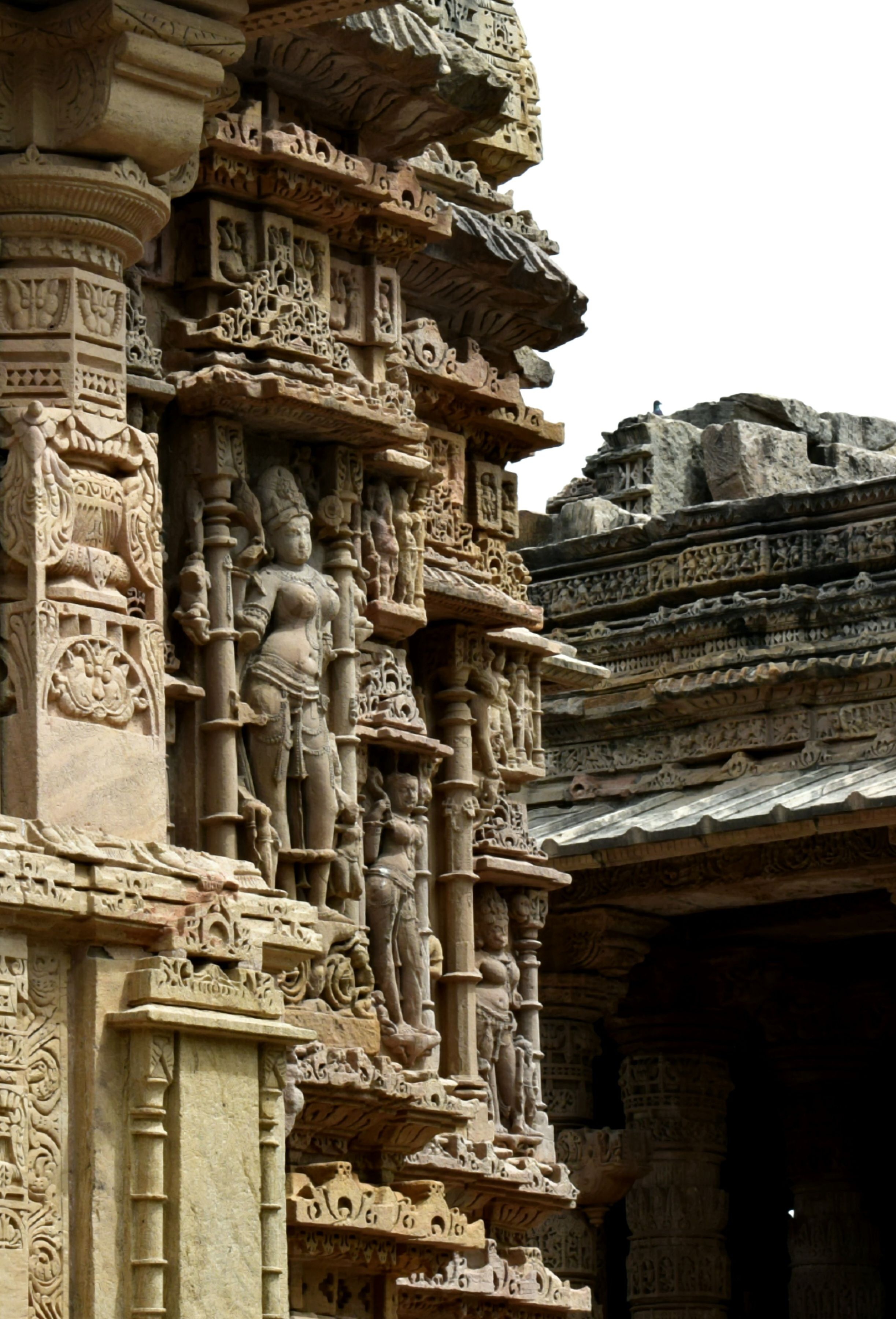 Intricate Stone Carvings on Ancient Temple Wall · Free Stock Photo