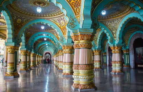 Free Stunning interior view of palace with colorful ornate columns and arches. Stock Photo