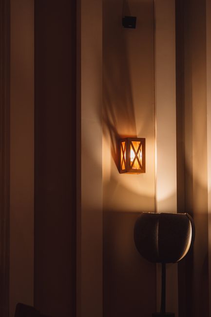 Photo by MD. Raktim Raze on Pexels A cozy indoor lighting setup with a rustic lamp casting a warm glow in a modern interior design.