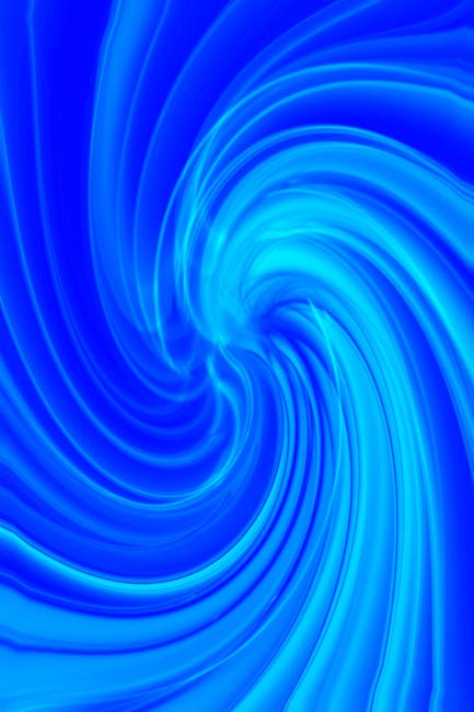 Dynamic swirl pattern in vibrant blue hues, featuring abstract fluid motion.
