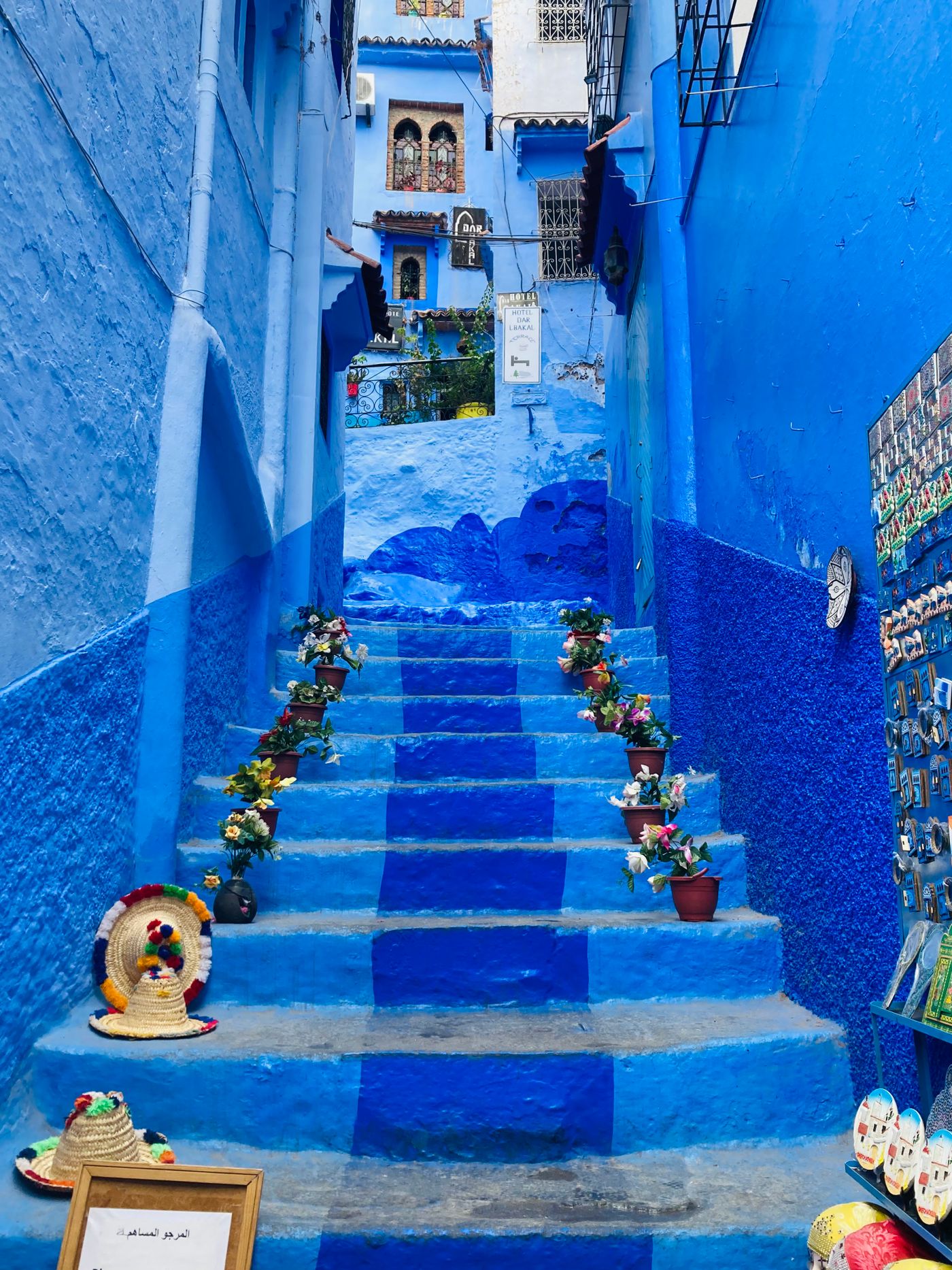 Vibrant blue alleyway in Chefchaouen medina, Morocco