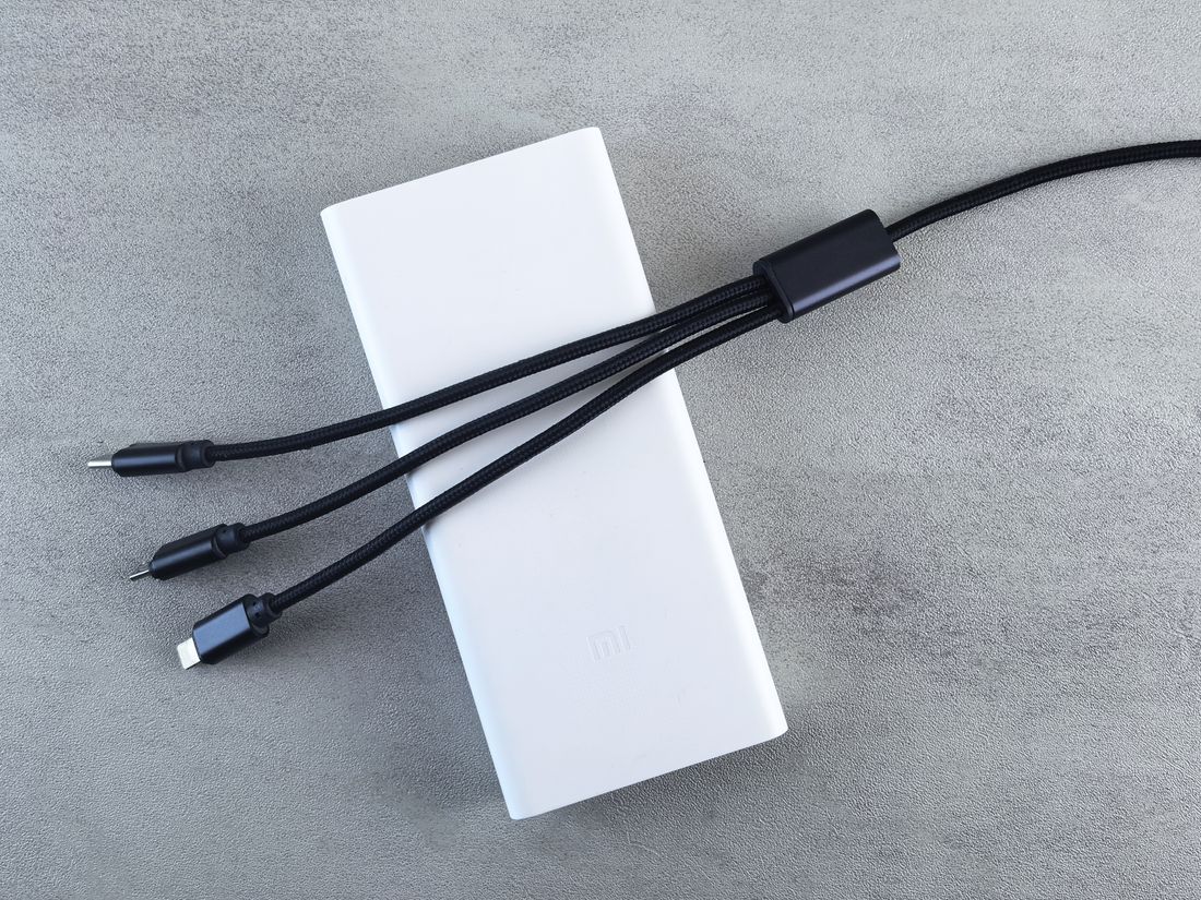 White power bank with three built-in charging cables