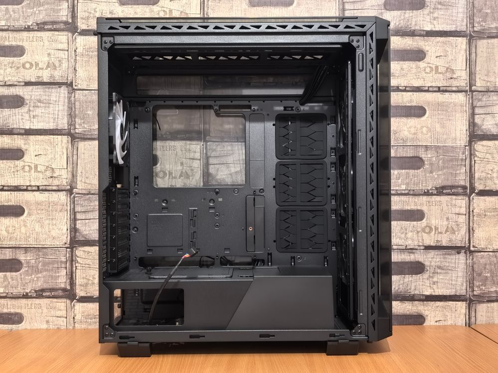 Pc Tower Case Layout Open Black Computer Tower Case on Wooden Surface · Free Stock Photo