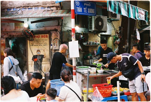 Vibrant street food stall in Hanoi captures local culture and daily life.