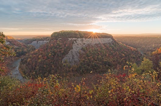 Breathtaking sunrise view of Letchworth State Park with autumn foliage in Castile, New York.