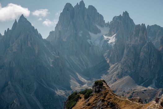 Breathtaking view of the towering Dolomites in Italy during a clear day.