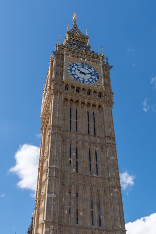 Free Big Ben tower in London captured on a sunny day with blue skies. Stock Photo