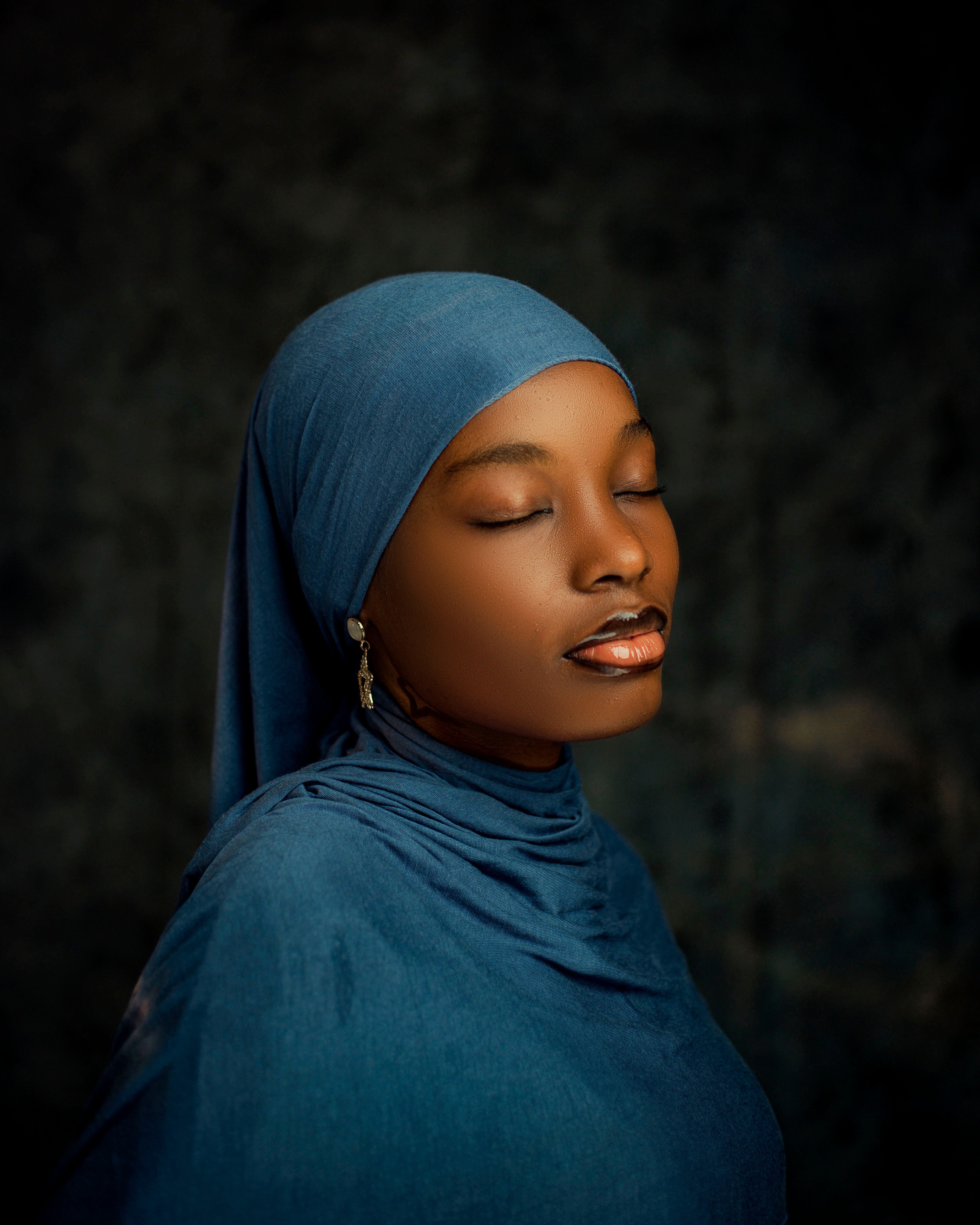 Portrait of Woman in Blue Hijab with Eyes Closed · Free Stock Photo