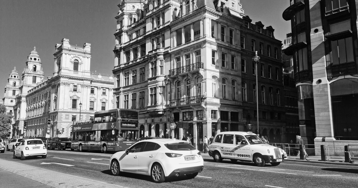 Car Accident No Win No Fee Solicitors: Your Complete Guide — Black and white image of iconic London street with classic architecture and traffic, captured in daylight.