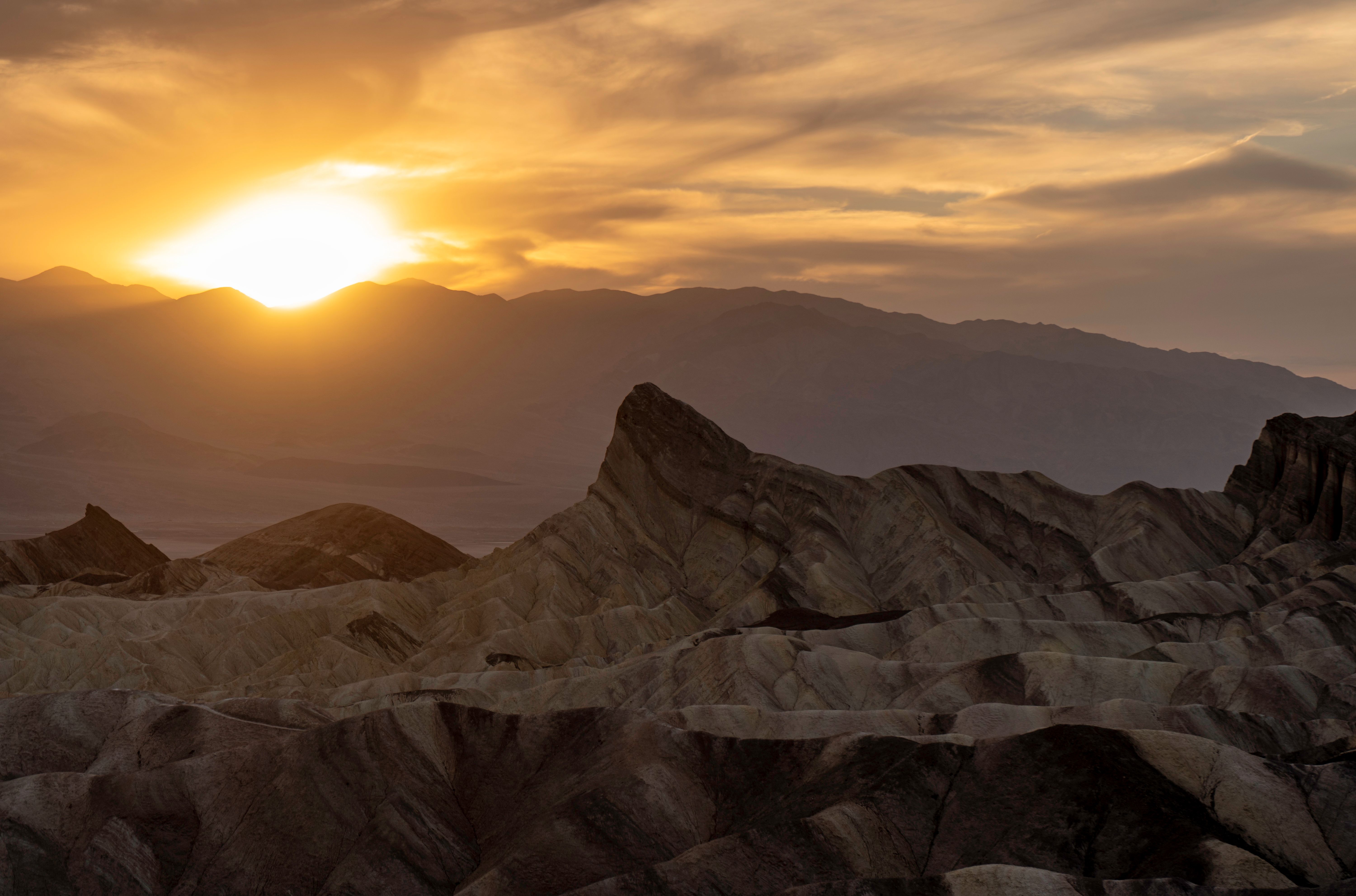 Dramatic Sunset Over Zabriskie Point in Death Valley · Free Stock Photo