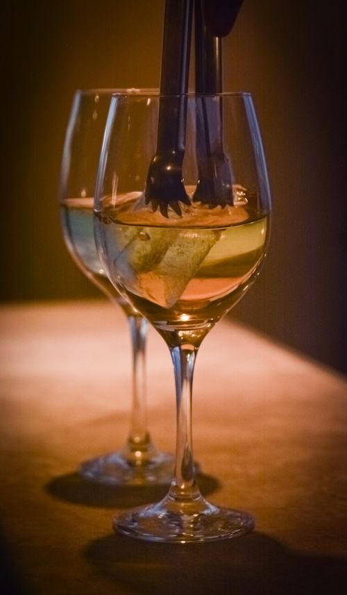 Free Close-up of wine glasses with ice, captured in warm lighting. Perfect for lifestyle and hospitality themes. Stock Photo