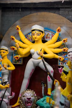 Traditional clay idol of Goddess Durga being crafted in Kumartuli, Kolkata for Durga Puja.
