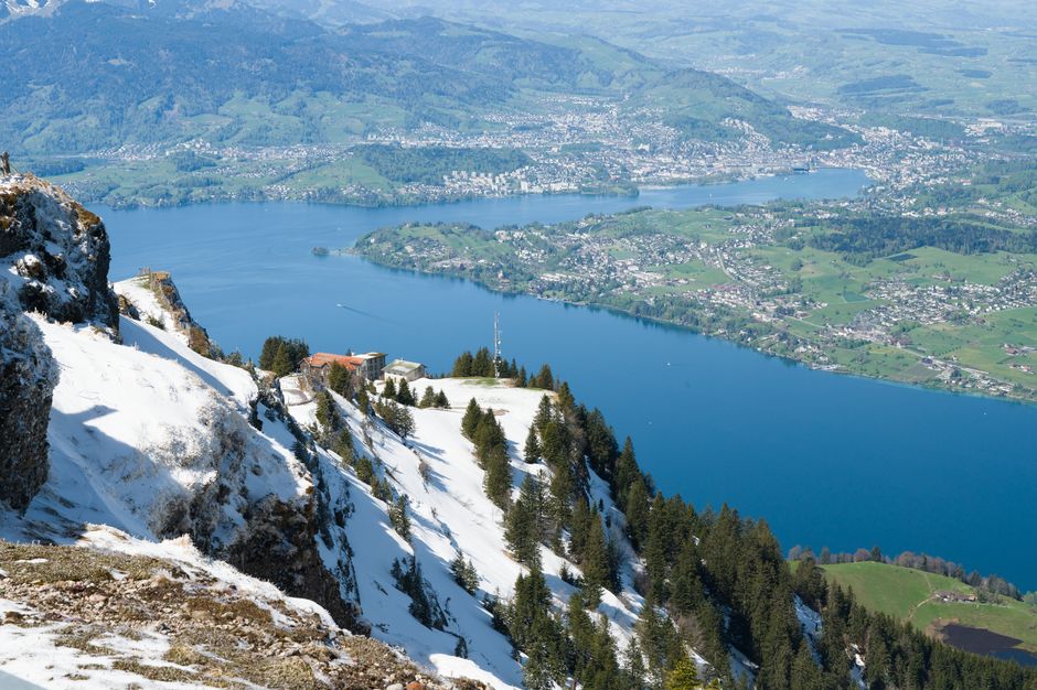 Breathtaking Private Swiss Alps Helicopter Tour Over Snow Covered Mountain Peaks and Glaciers Review Review 2026 - Breathtaking view of Lake Lucerne from snow-covered Mount Rigi, Switzerland.