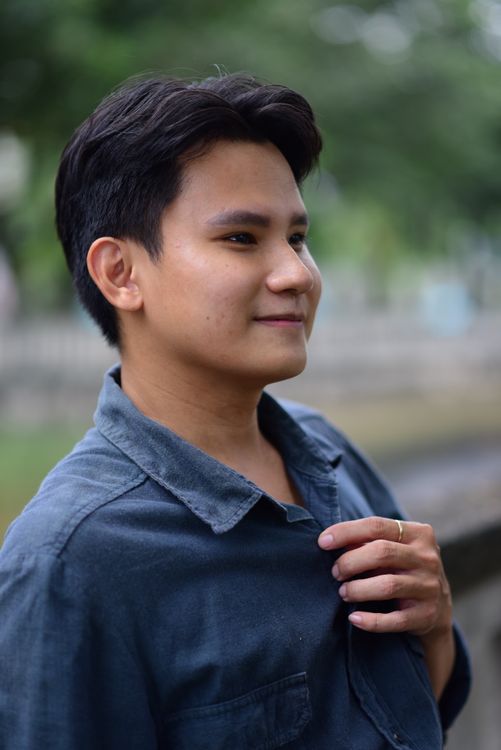 Portrait of Young Man in a Natural Outdoor Setting · Free Stock Photo