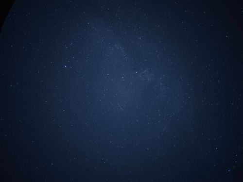 Free Beautiful star-filled night sky showcasing the Milky Way galaxy. Stock Photo